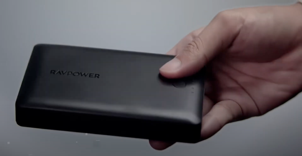 Hand holding an RAVPower Portable Charger 16750mAh